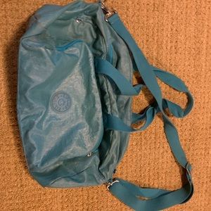 Great cond. Kipling travel bag. Waxed turquoise.